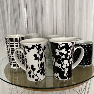 8 black and white porcelain mugs